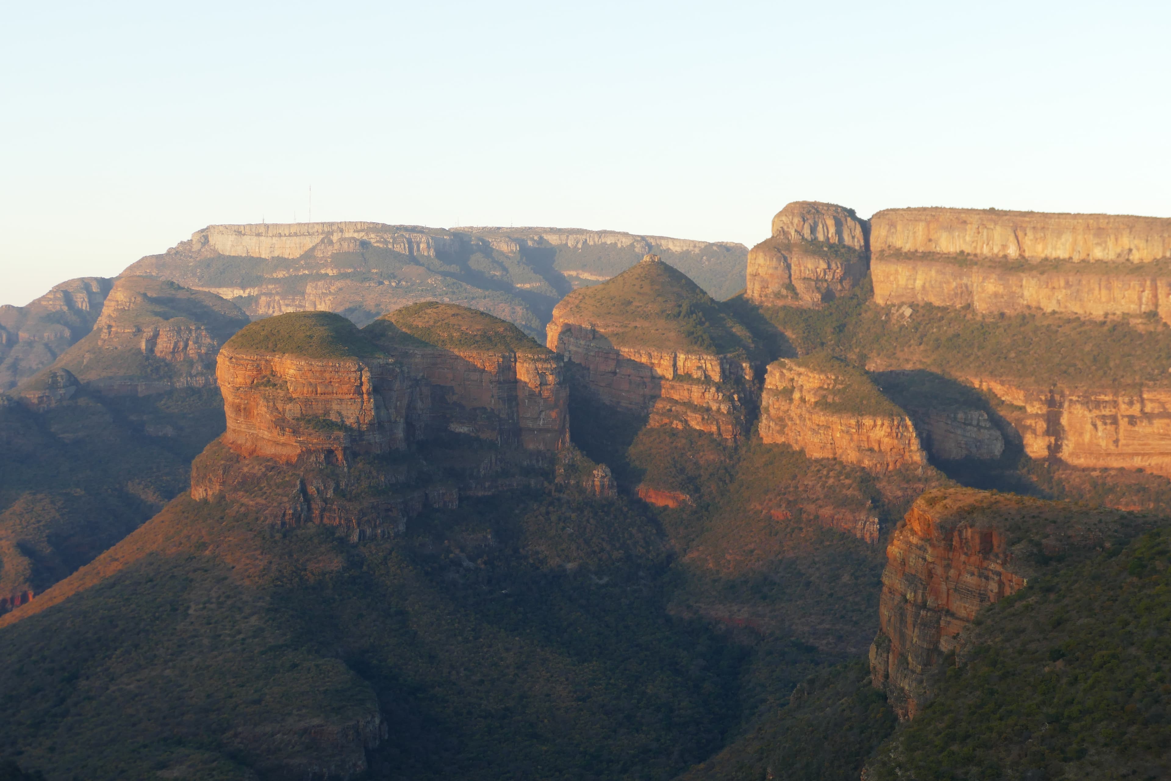 Three round rock peaks of the Three Rondavels above the green Blyde River Canyon, Mpumalanga